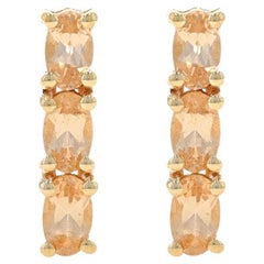 Yellow Gold Precious Topaz Three-Stone Drop Earrings - 10k Oval 1.68ctw Pierced