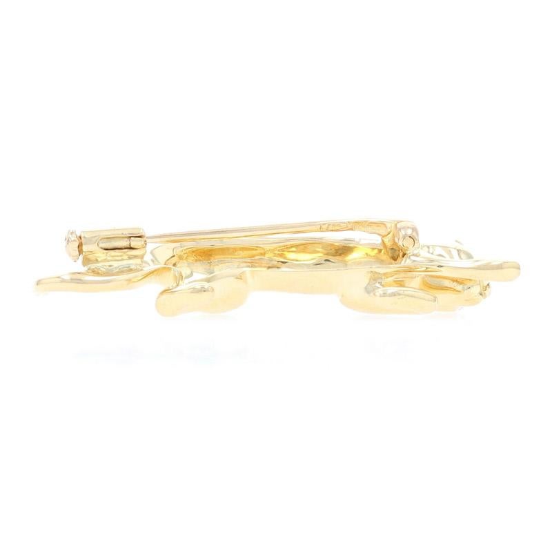 Metal Content: 18k Yellow Gold

Style: Brooch 
Closure Type: Hinged Pin and Trombone Clasp
Theme: Prowling Panther / Jungle Cat 

Measurements: 
Tall: 23/32