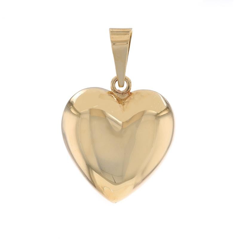 Metal Content: 14k Yellow Gold

Theme: Puffy Heart, Love
Features: Hollow construction for comfortable, all-day wear

Measurements

Tall (from stationary bail): 13/16