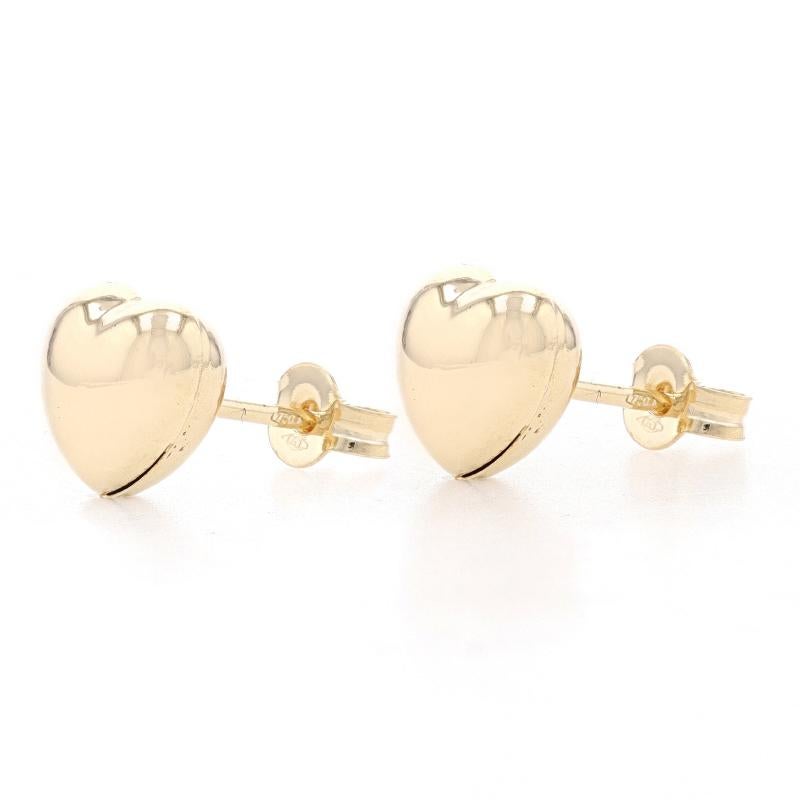 Metal Content: 18k Yellow Gold

Style: Stud
Fastening Type: Butterfly Closures
Theme: Puffy Heart and Love

Measurements

Tall: 3/8