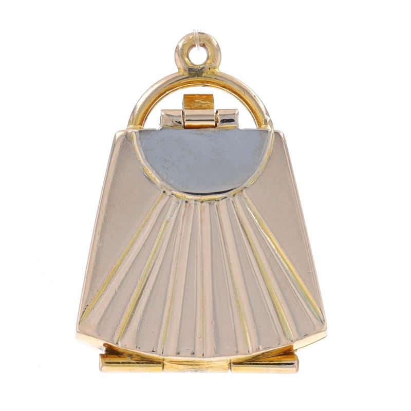 Metal Content: 14k Yellow Gold & 14k White Gold

Style: Locket
Theme: Purse, Handbag, Fashion Accessory
Features: The pendant opens to hold two treasured photographs or a tiny keepsake trinket.

Measurements
Tall (from stationary bail): 1 1/16