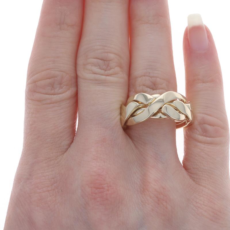 Size: 10 1/4

Metal Content: 14k Yellow Gold

Style: Puzzle Band

Measurements
Face Height (north to south): 13/32