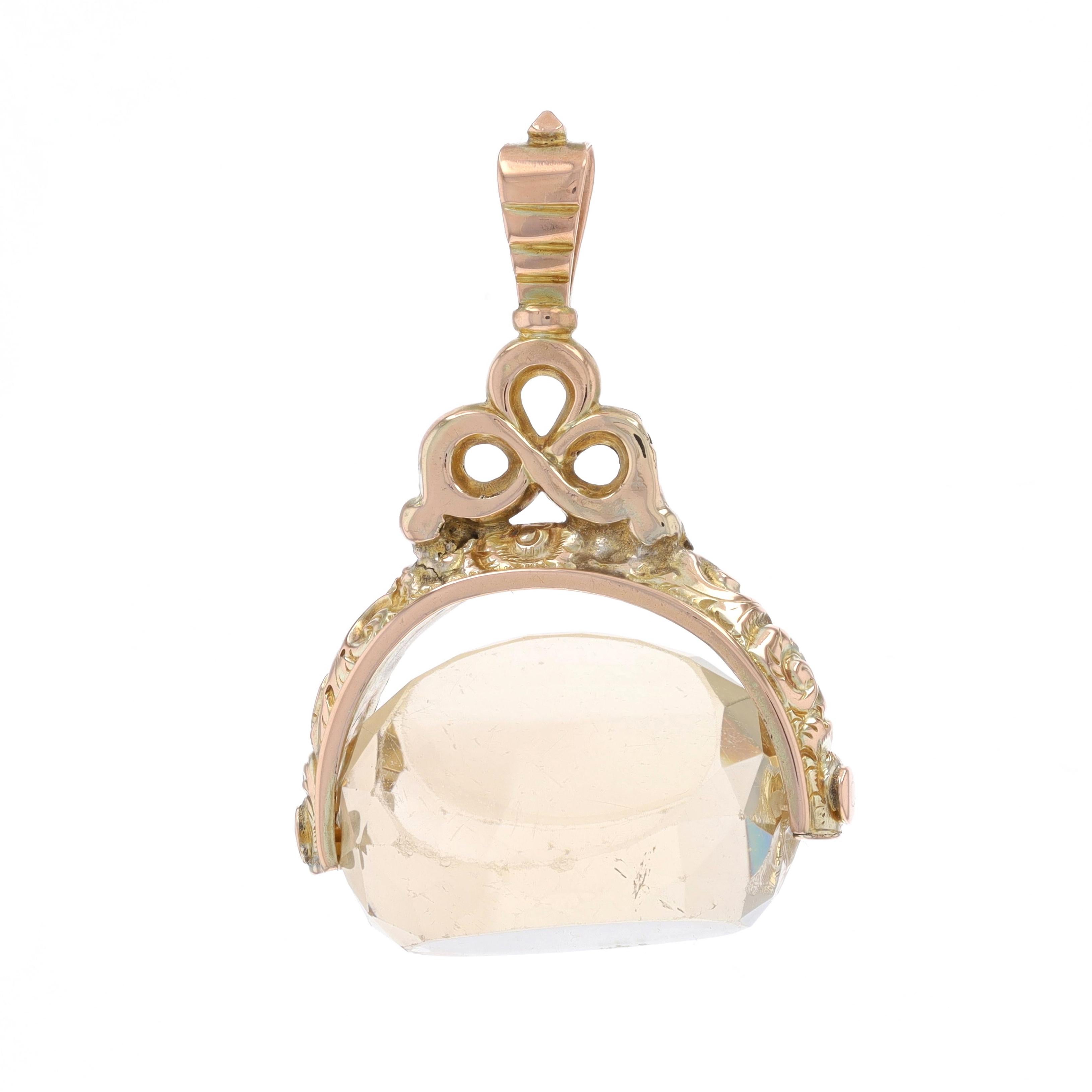 Era: Victorian
Date: 1860s - 1880s

Metal Content: 9k Yellow Gold

Stone Information

Natural Quartz
Cut: Fancy
Color: Light Yellow

Style: Fob
Theme: Scrollwork
Features: Etched Scrollwork Detailing

Measurements

Tall (from stationary bail): 1