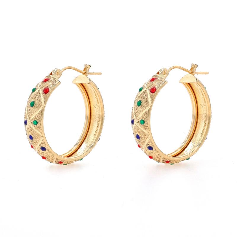 Metal Content: 14k Yellow Gold

Material Information
Enamel
Color: Translucent Red, Green, & Blue

Style: Hoop
Fastening Type: Snap Closures
Theme: Quilted Polka Dot
Features: Etched with Stardust-Textured Detailing

Measurements
Tall: 7/8