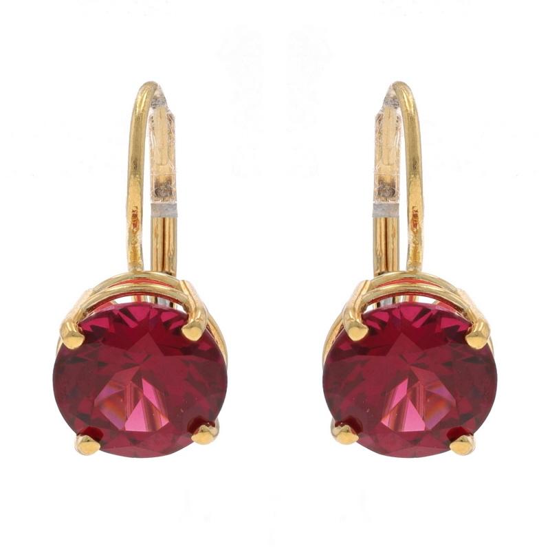 Metal Content: 14k Yellow Gold

Stone Information

Natural Rhodolite Garnets
Carat(s): 5.00ctw
Cut: Round
Color: Purplish Red

Total Carats: 5ctw

Style: Drop
Fastening Type: Leverback Closures

Measurements

Tall: 5/8