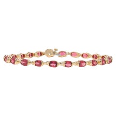 Bracciale tennis in oro giallo con granato rodolite 7 1/2" - 14k ovale 9.02ctw