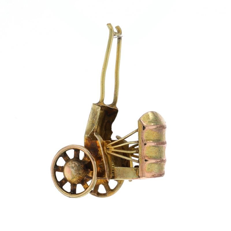Metal Content: 14k Yellow Gold

Theme: Rickshaw, Carriage Transportation
Features: Wheels Move

Measurements
Tall (from handles to wheels): 1 3/32