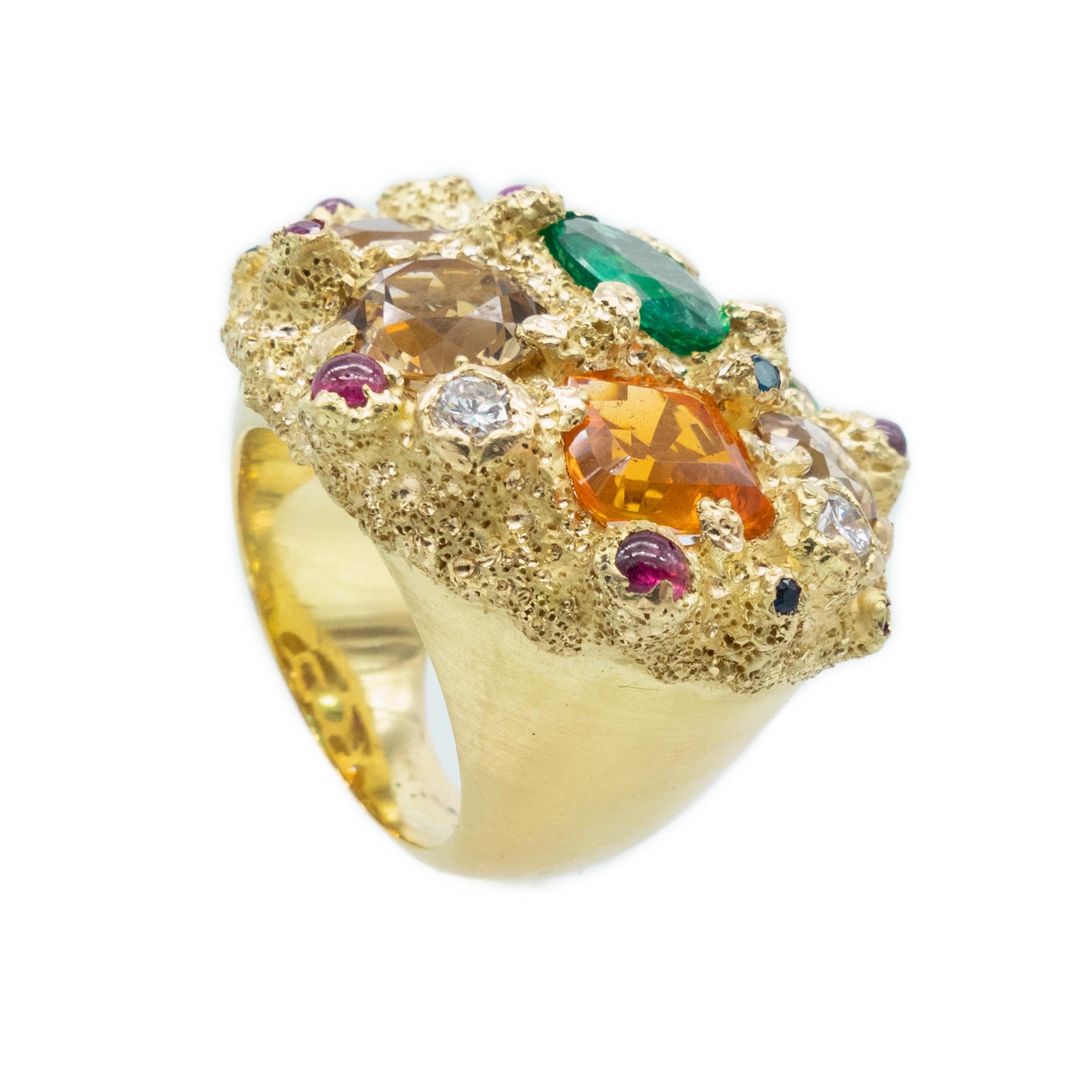Yellow Gold Ring Emerald Beryl Champagne Peridot Mint Fire Opal Rubies Diamonds

Introducing our magnificent Galaxy ring, a true marvel of celestial beauty and craftsmanship. Part of our esteemed Galaxy collection, this ring holds a special place in