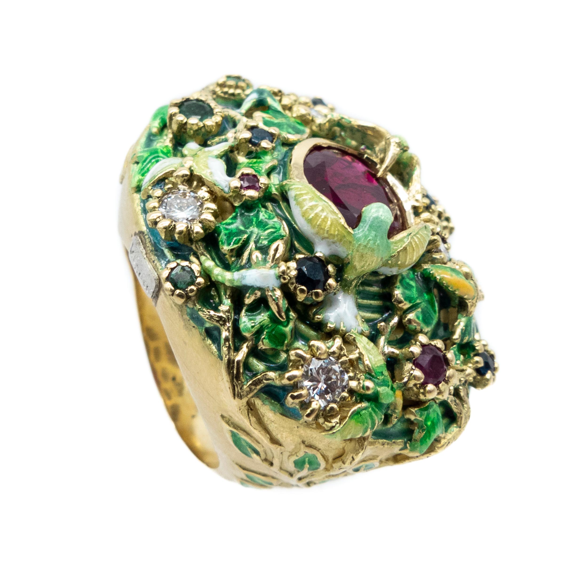 Yellow Gold Ring Enamels Central Ruby Diamonds Sapphires Emeralds Rubies Birds


Introducing our stunning 18-karat yellow gold ring, a magnificent masterpiece from our esteemed Fountain of Life collection. This exquisite piece encapsulates the very