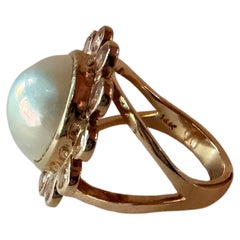 Anillo de oro amarillo. Anillo de perlas «Daisy» con topacio rosa. Por Make Merveille