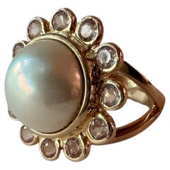 Anillo de oro amarillo. Anillo de perlas «Daisy» con topacio rosa. Por Make Merveille