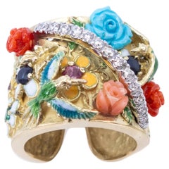 Anello in oro giallo Oro bianco Diamanti Smalti Rubini Zaffiri Smeraldo Turchese