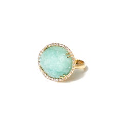 Bague en or jaune avec diamants et émeraude taillée en fleur