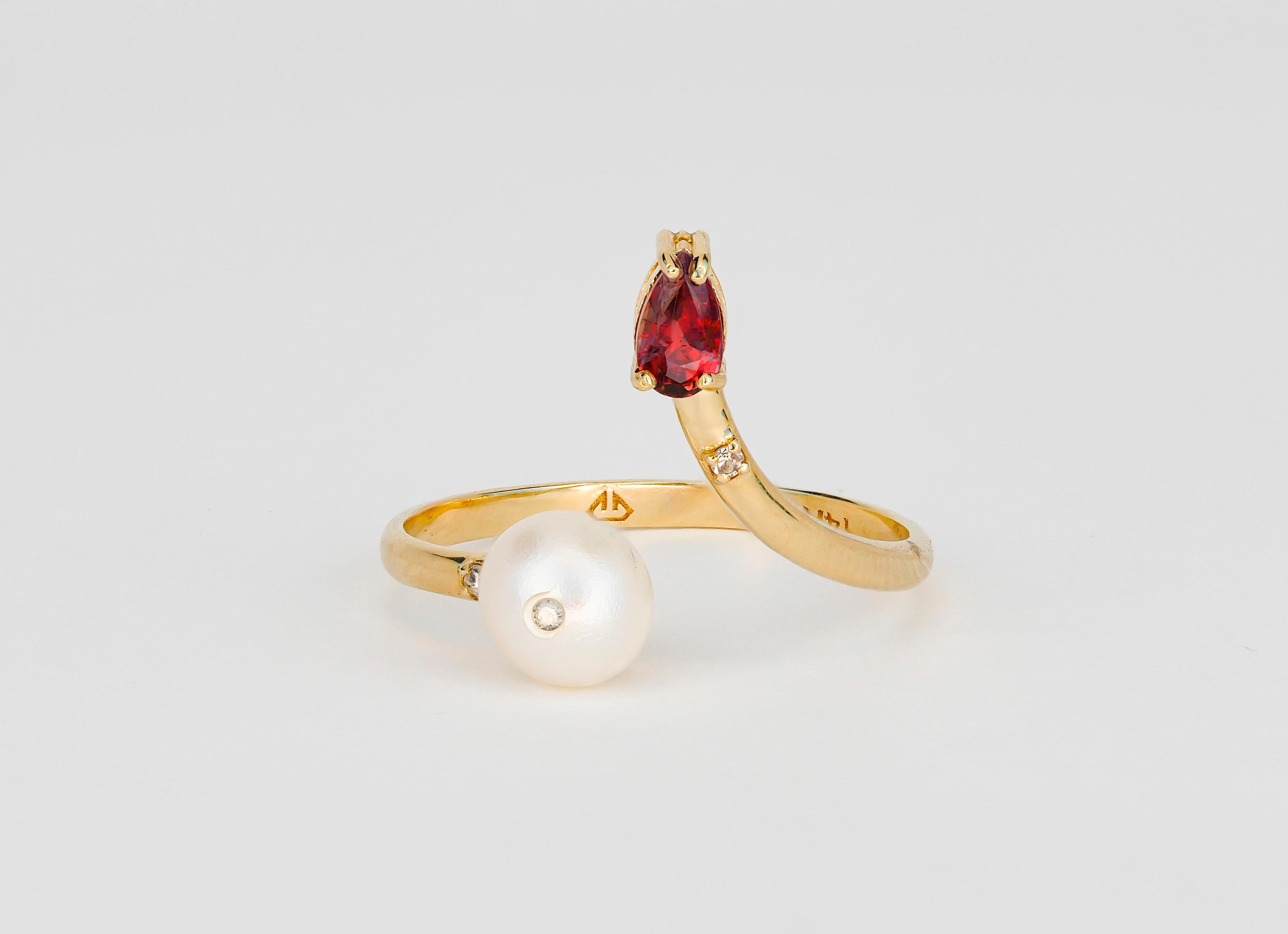 Modern Yellow gold ring with pearl, garnet and diamonds.  For Sale