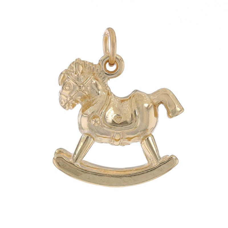 Metal Content: 14k Yellow Gold

Theme: Rocking Horse, Classic Child's Toy

Measurements

Tall (from stationary bail): 21/32