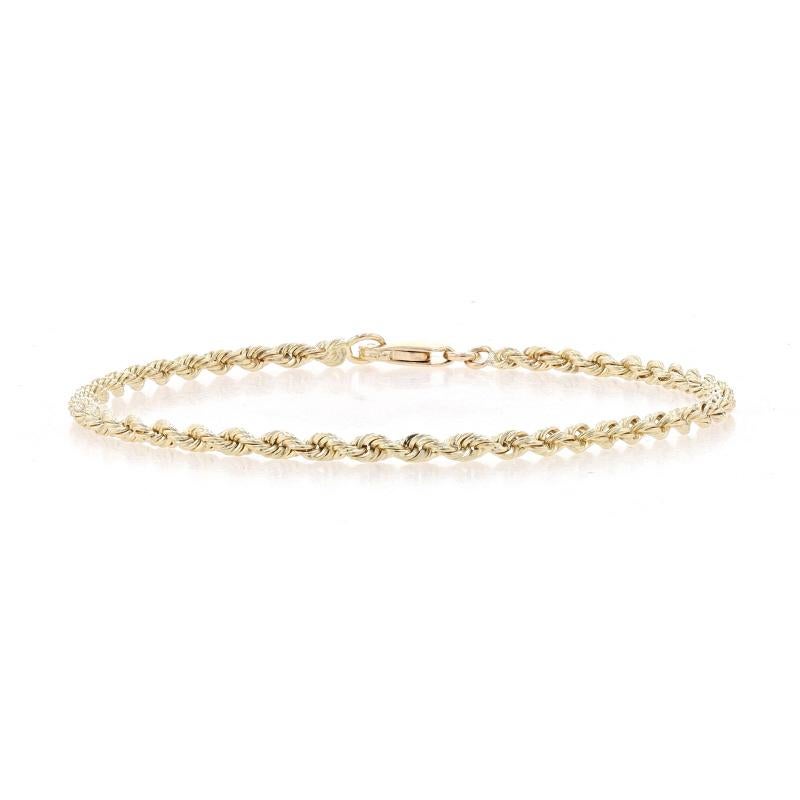 Metal Content: 14k Yellow Gold

Chain Style: Rope
Bracelet Style: Chain
Fastening Type: Lobster Claw Clasp
Features: Hollow Constructed Links

Measurements
Length: 6 1/2