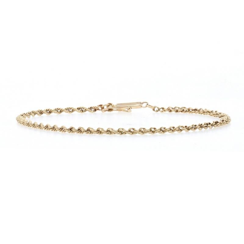 Metal Content: 14k Yellow Gold

Chain Style: Rope
Bracelet Style: Chain
Fastening Type: Tube Box Clasp with One Side Safety Clasp

Measurements
Length: 8 1/2