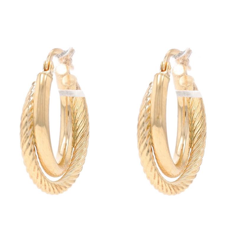 Metal Content: 10k Yellow Gold

Style: Crossover Double Hoop
Fastening Type: Snap Closures
Theme: Rope, Nautical
Features: Hollow construction for comfortable, all-day wear

Measurements

Tall: 3/4