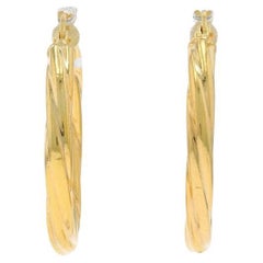 Boucles d'oreilles torsadées en or jaune - 14k percées