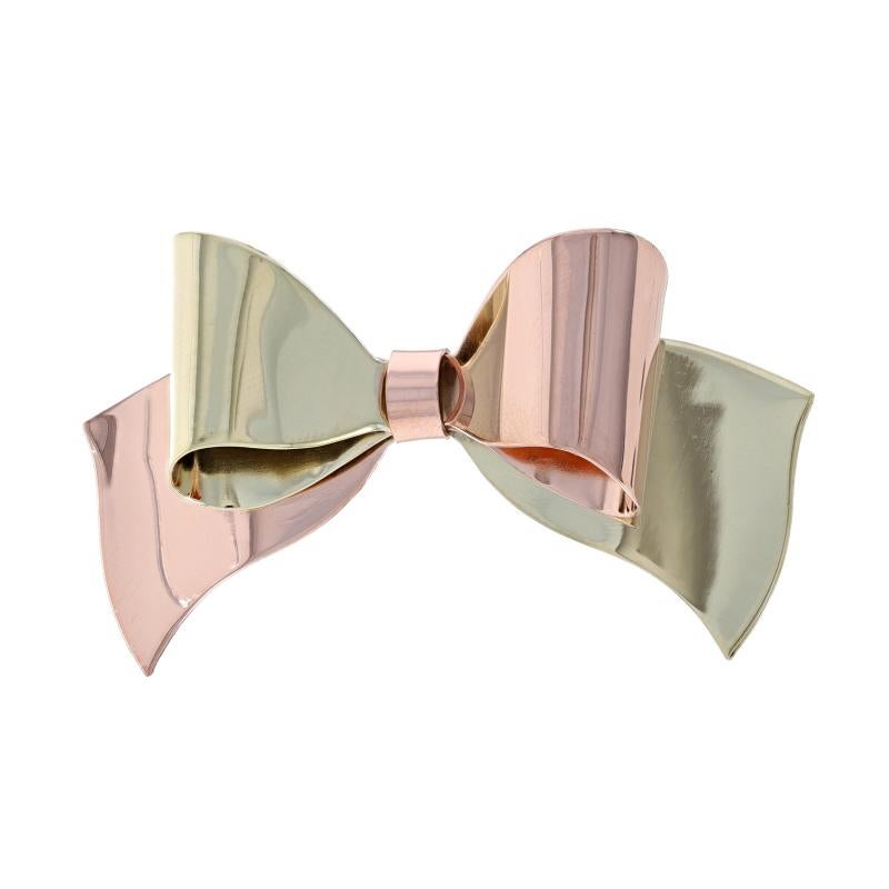 Era: Vintage

Metal Content: 14k Yellow Gold & 14k Rose Gold

Style: Brooch
Fastening Type: Hinged Pin and Locking C-Clasp
Theme: Bow, Ribbon

Measurements
Tall: 1 1/16