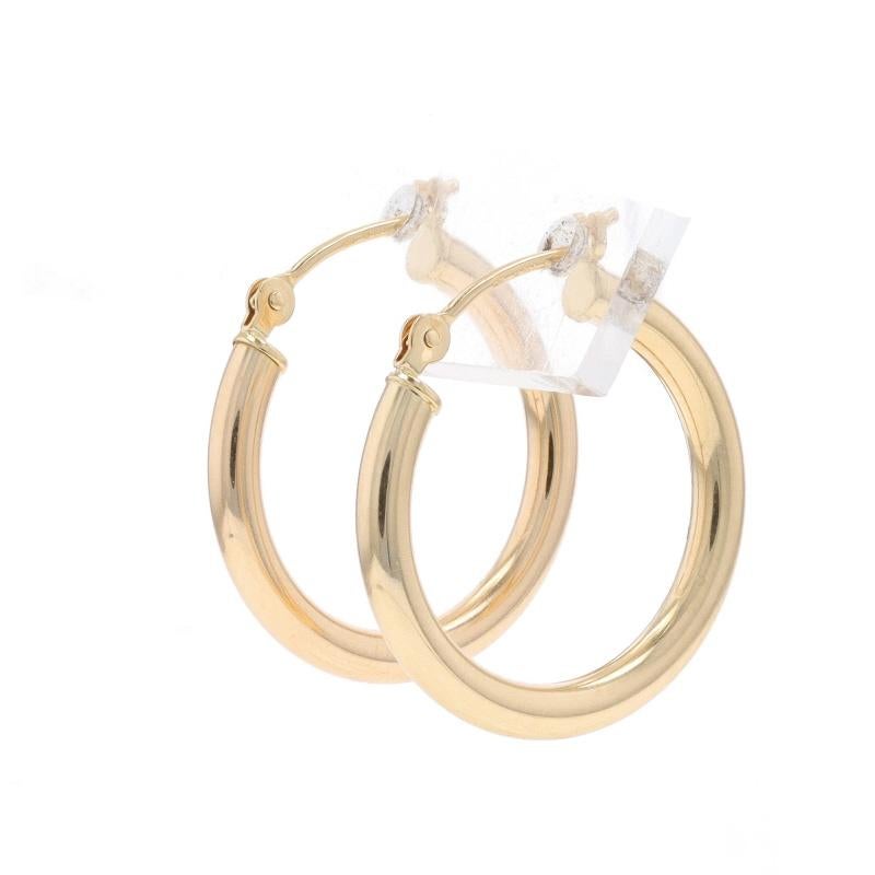 Metal Content: 14k Yellow Gold

Style: Hoop
Fastening Type: Snap Closures
Features: Hollow construction for comfortable, all-day wear

Measurements
Tall: 3/4
