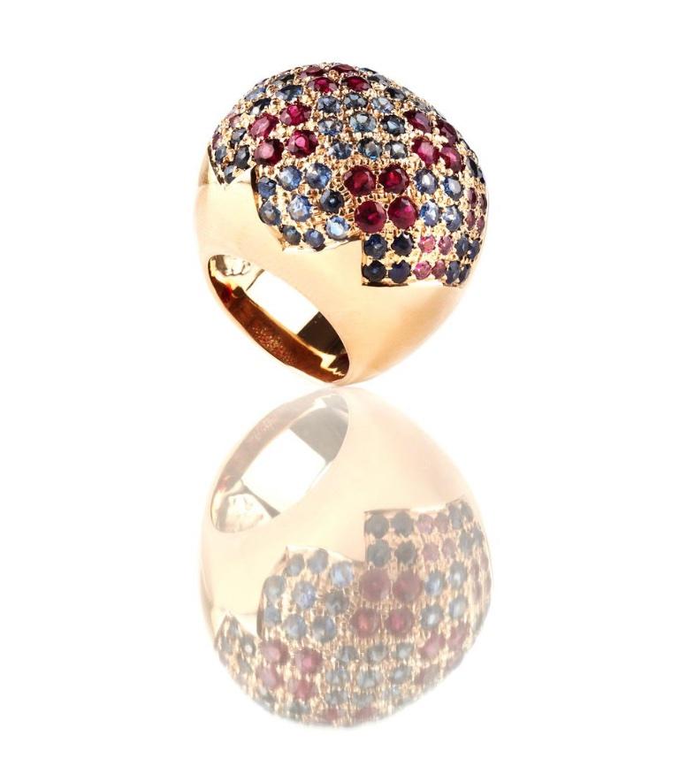 Hand Made in 18 karat yellow gold with 16 natural Rubelites, 24 natural Burmese Blue Sapphires, 35 natural Light Blue Sapphires and 16 natural Pink Sapphires, all round brilliant cut. This extraordinary domed cocktail ring is a show stopper in any