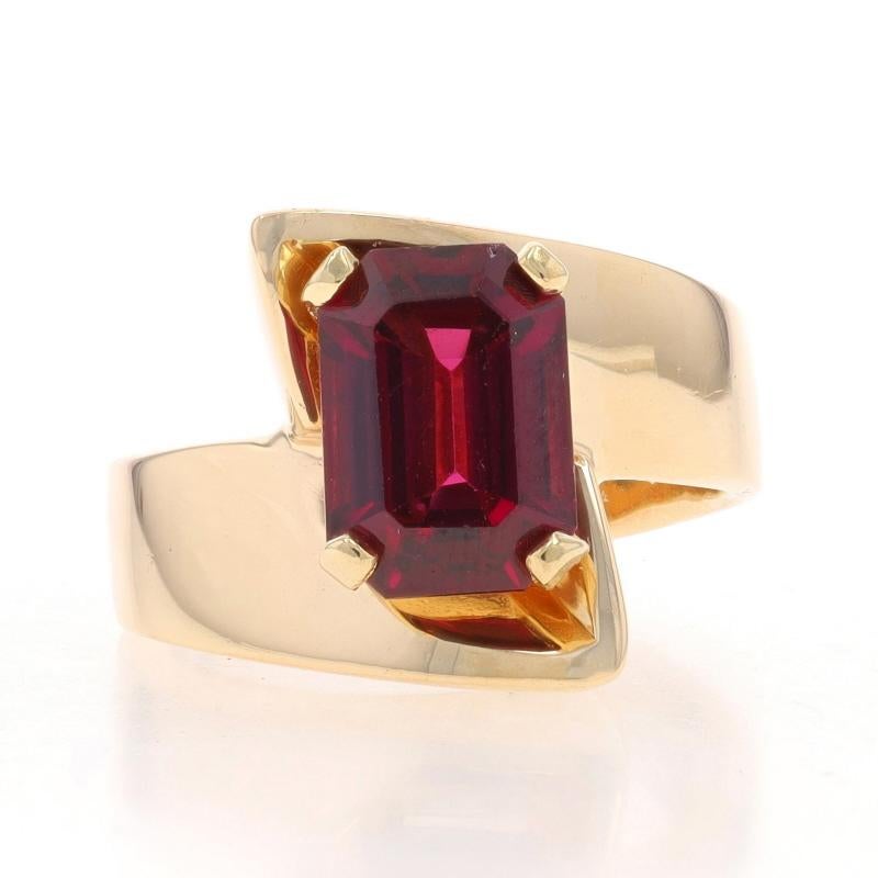 Size: 5 1/2
Sizing Fee: Up 4 sizes for $50 or Down 2 sizes for $40

Metal Content: 14k Yellow Gold

Stone Information

Natural Rubellite Tourmaline
Carat(s): 2.34ct
Cut: Emerald
Color: Purplish Red

Total Carats: 2.34ct

Style: Bypass