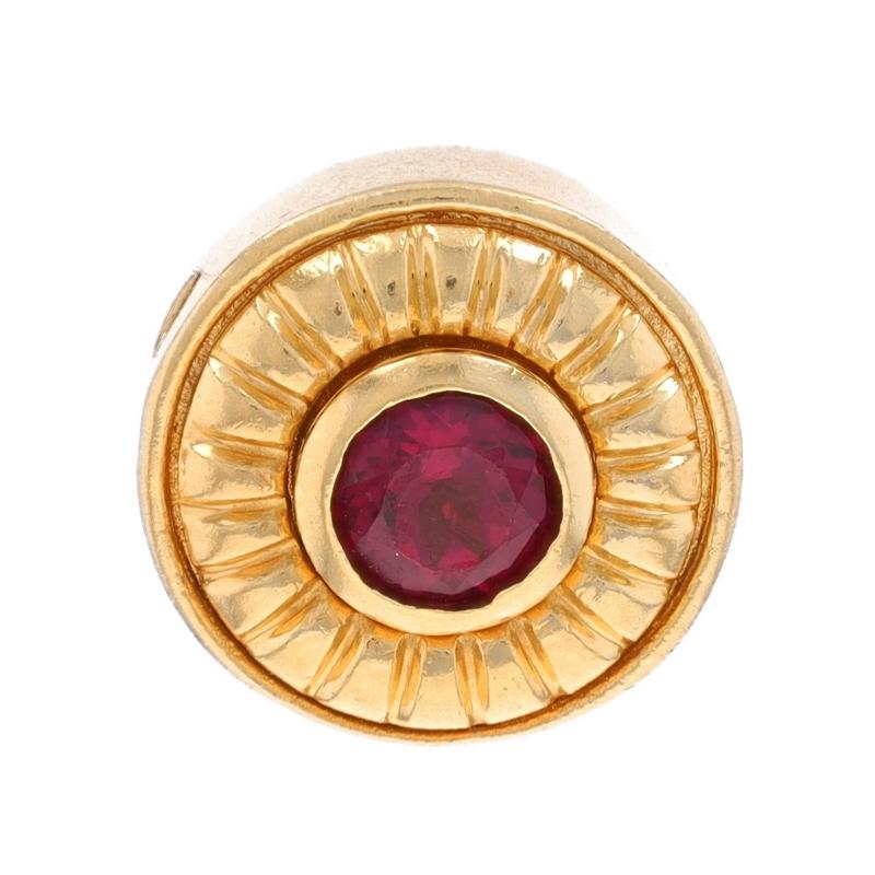 Design:  slide charm
Era: Vintage

Metal Content: 14k Yellow Gold

Stone Information

Natural Rubellite Tourmaline
Carat(s): 1.10ct
Cut: Round

Total Carats: 1.10ct

Style: Solitaire Slide

Measurements

Tall: 5/8