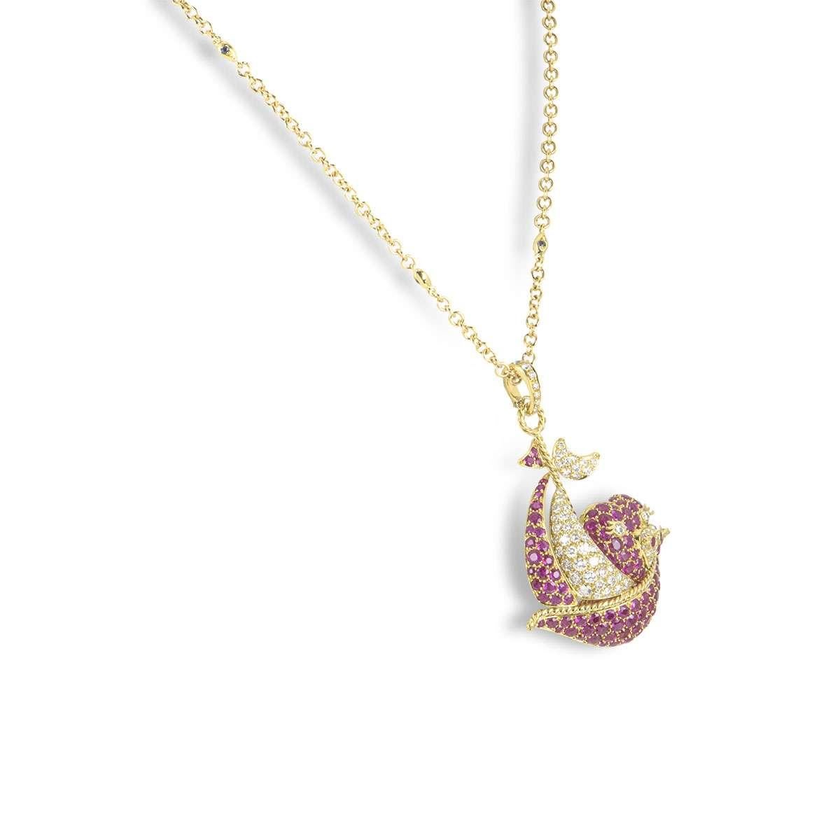An 18k yellow gold ruby and diamond pendant. The pendant features a large sailing boat motif, set with round brilliant cut diamonds and rubies. The diamonds have a total weight of approximately 1.63ct and the rubies total approximately 4.69ct. The