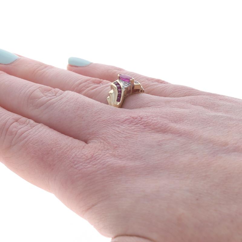 Women's Yellow Gold Ruby Diamond Bypass Ring 10k Marquise and Round .88ctw For Sale