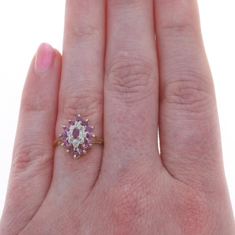 Size: 6 1/4
Sizing Fee: Up 2 sizes for $35 or Down 2 sizes for $35

Metal Content: 10k Yellow Gold & 10k White Gold

Stone Information

Natural Rubies
Treatment: Heating
Carat(s): 1.04ctw
Cut: Round and Marquise

Natural Diamonds
Carat(s):