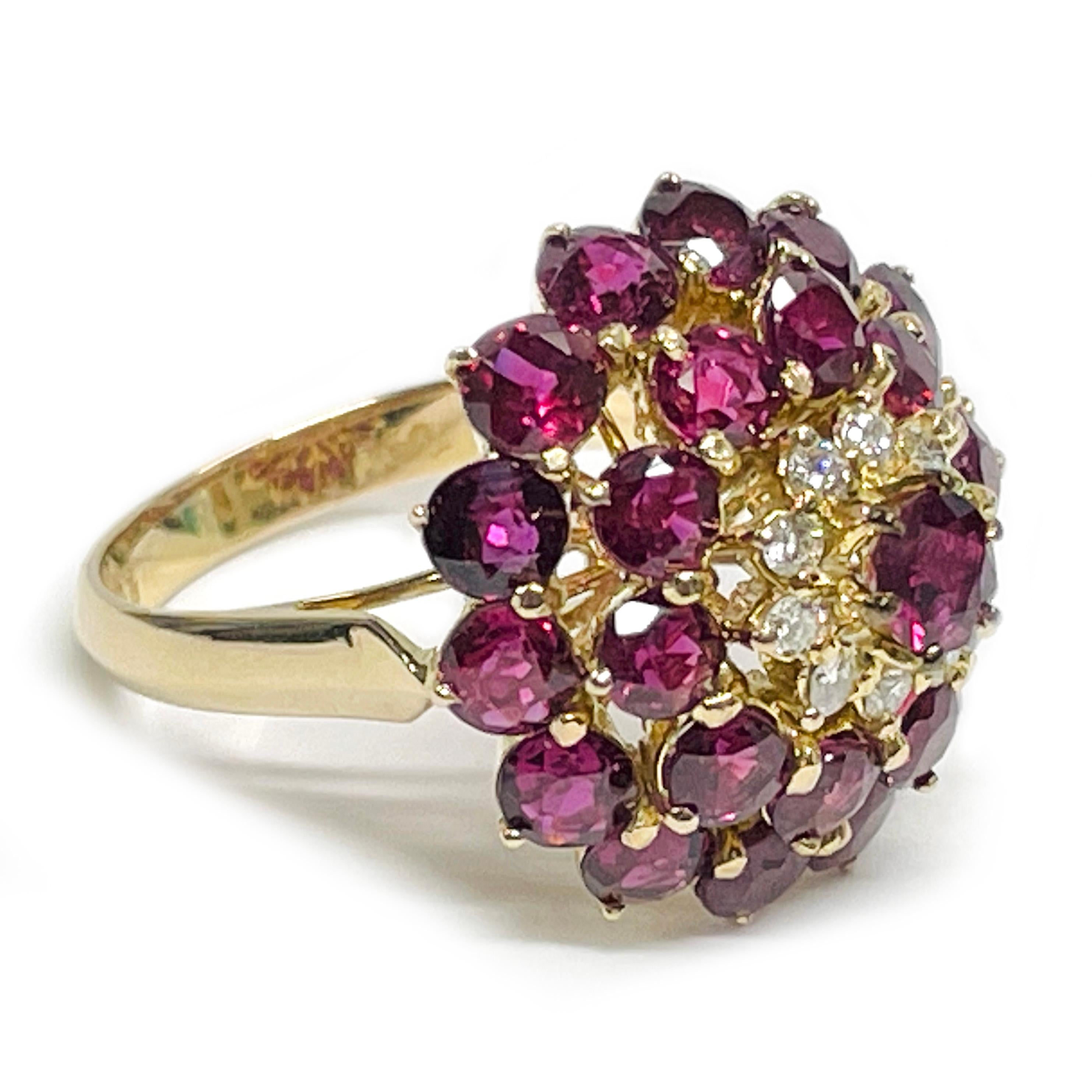 14 Karat Yellow Gold Ruby Diamond Cluster Ring. The cluster ring features twenty-five round rubies and ten round diamonds all prong-set in a dome formation. The rubies range in size from 3.1 to 3.3mm and have a total carat weight of 1.10ctw. The