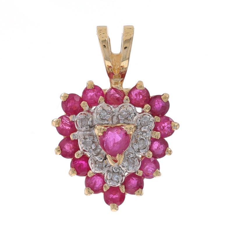 Metal Content: 14k Yellow Gold & 14k White Gold

Stone Information

Natural Rubies
Treatment: Heating
Carat(s): .81ctw
Cut: Heart & Round
Color: Pinkish Red

Natural Diamonds
Carat(s): .05ctw
Cut: Single
Color: H - I
Clarity: SI1 - SI2

Total