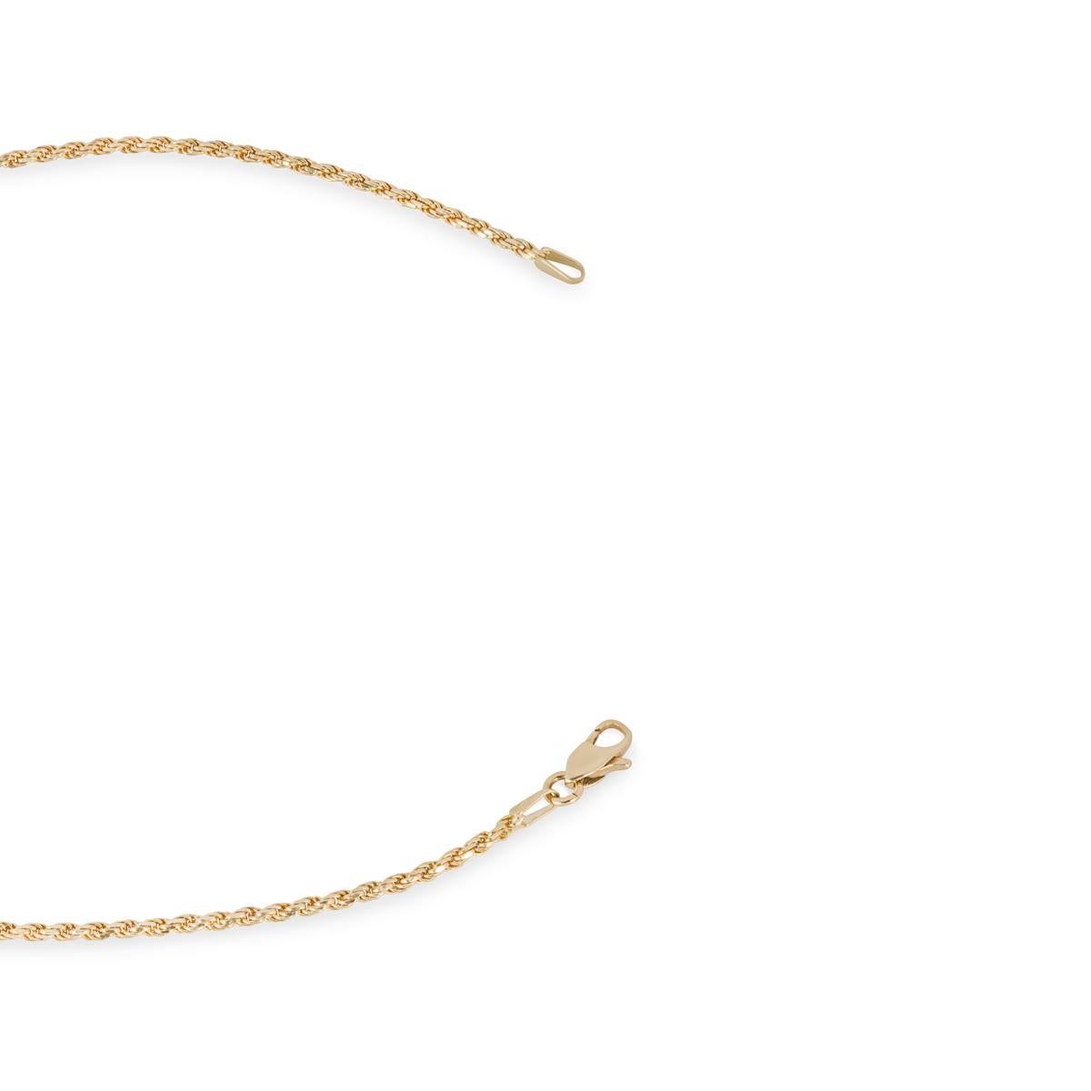Pendentif en or jaune avec rubis et diamants Excellent état - En vente à London, GB