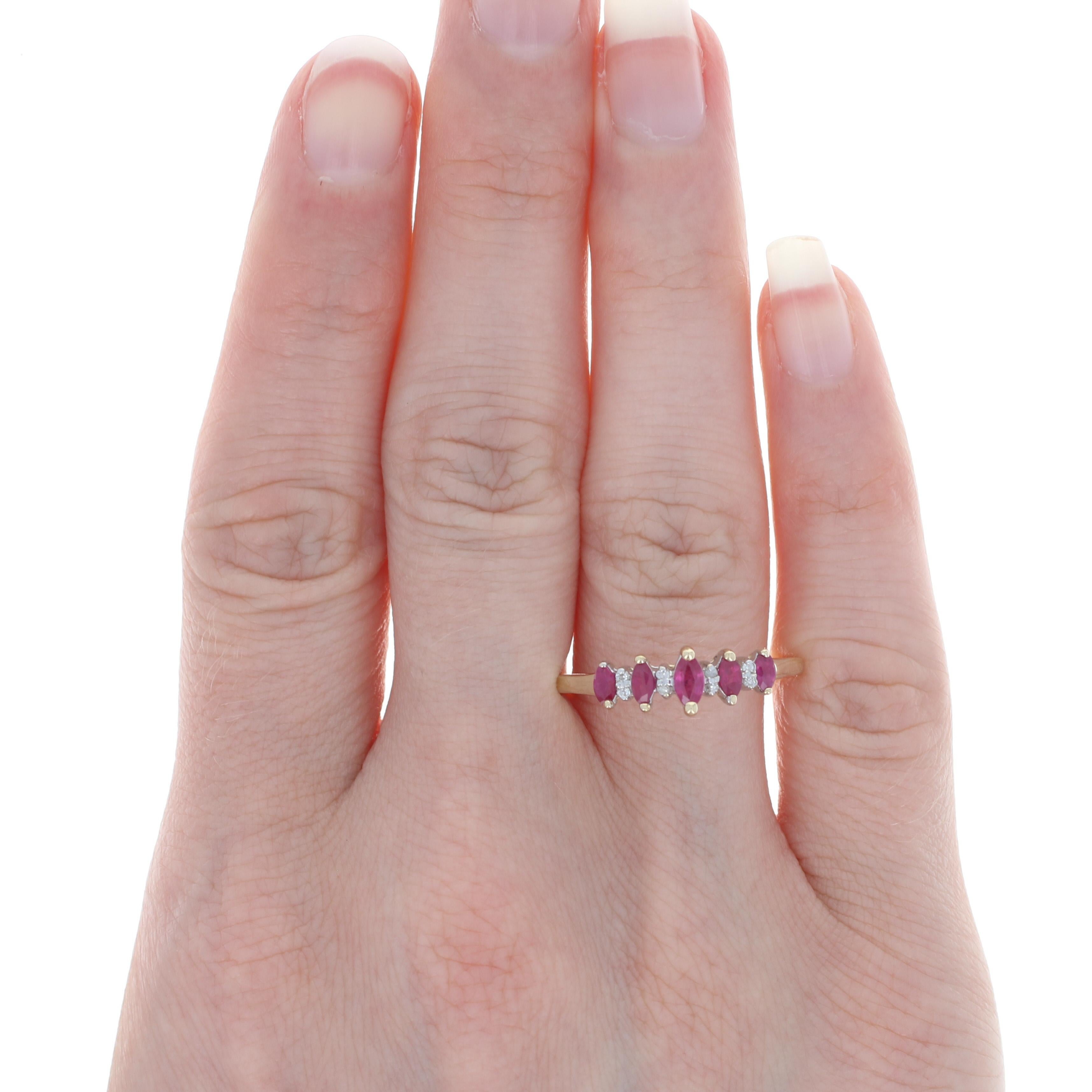 Size: 11
 Sizing Fee: Can be sized down 6 sizes for $20 or sized up 2 sizes for $25
 
 Metal Content: 10k Yellow Gold & 10k White Gold
 
 Stone Information: 
 Genuine Rubies
 Treatment: Heating
 Carat(s): .60ctw
 Cut: Marquise
 Color: Pinkish Red
 
