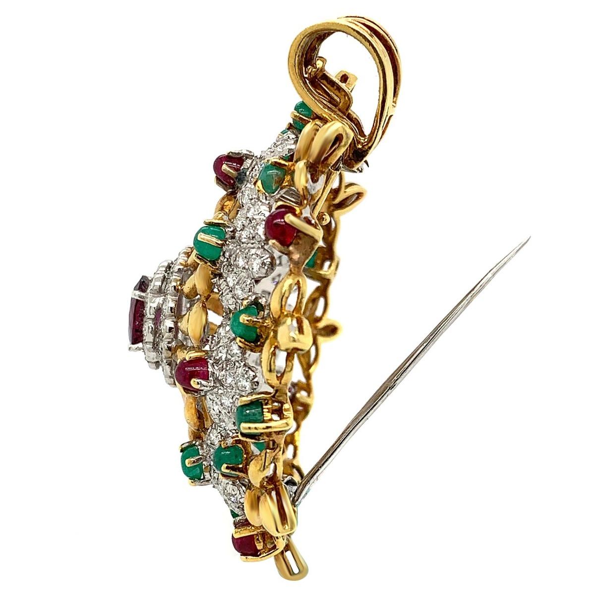 Yellow Gold Ruby Emerald Pendant Brooch 

Metal: Yellow Gold
Excellent Condition
Year of Manufacture: 1940s
Gemstone: Ruby & Emerald
Ruby (Center Stone) Weight: 2 CT
Item Weight: 36.3 grams
Length: 2.3 inch
Width: 1.9 inch