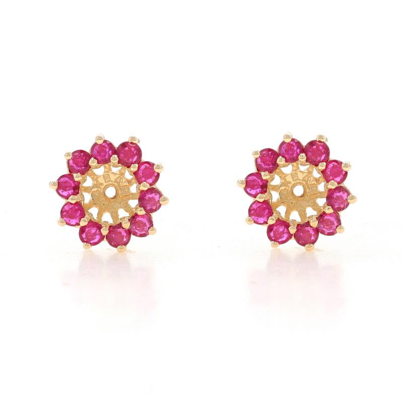 Metal Content: 14k Yellow Gold

Stone Information
Natural Rubies
Treatment: Heating
Carat(s): 2.40ctw
Cut: Round
Color: Pinkish Red

Total Carats: 2.40ctw

Style: Halo Earring Enhancer Stud Jackets

Measurements
Tall: 7/16