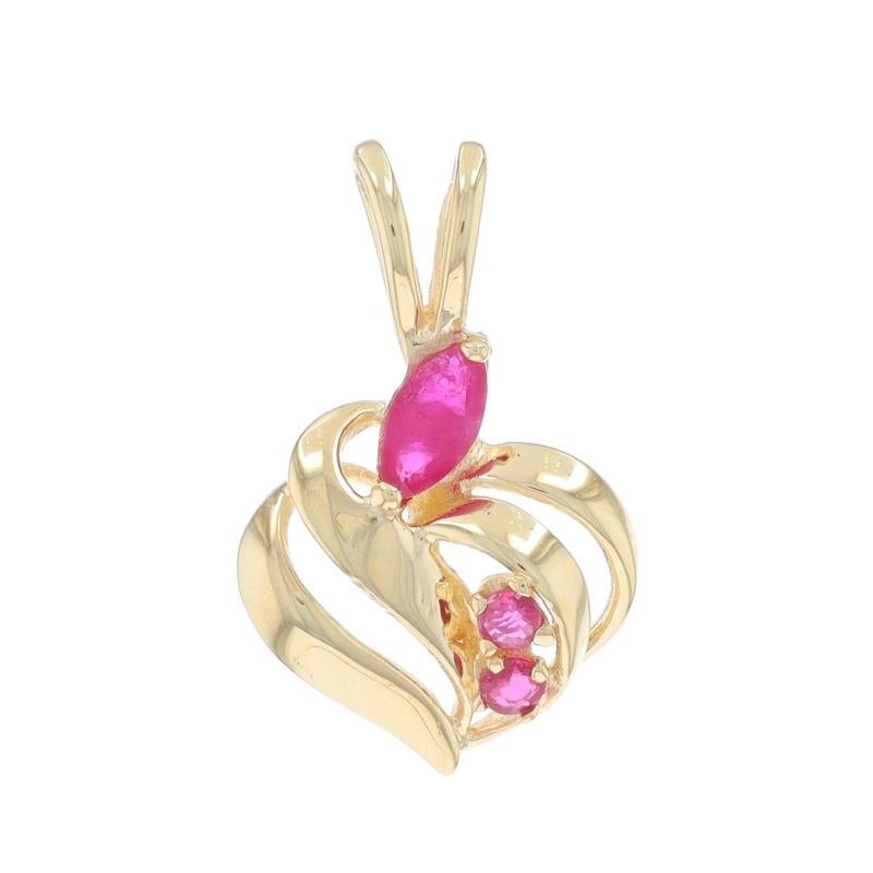 Metal Content: 14k Yellow Gold

Stone Information

Natural Rubies
Treatment: Heating
Carat(s): .36ctw
Cut: Marquise & Round
Color: Pinkish Red

Total Carats: .36ctw

Style: Solitaire with Accents
Theme: Heart, Love
Features: Open Cut