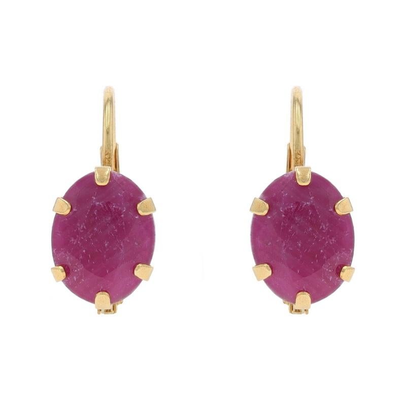 Metal Content: 14k Yellow Gold

Stone Information

Natural Ruby
Treatment: Heating
Carat(s): 3.00ctw
Cut: Oval

Total Carats: 3.00ctw

Style: Drop
Fastening Type: Leverback Closures
Theme: Solitaire

Measurements

Tall: 9/16
