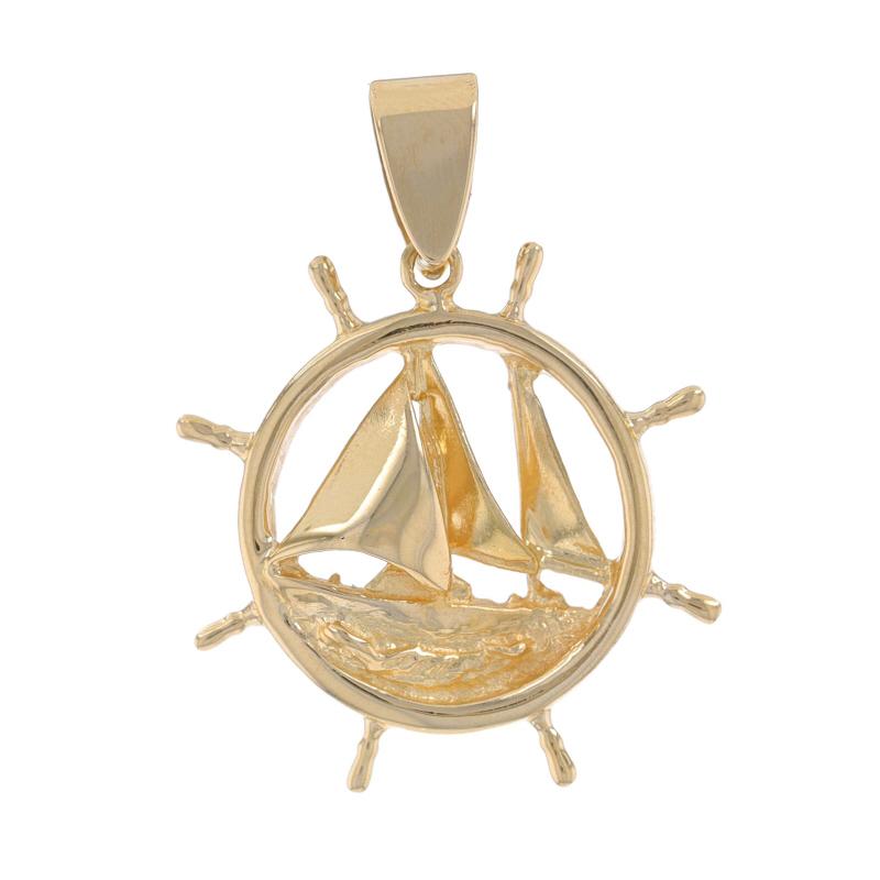 Metal Content: 14k Yellow Gold

Theme: Sailboat Helm, Nautical Travel
Features: Open Cut Design

Measurements

Tall (from extended bail): 1 11/32