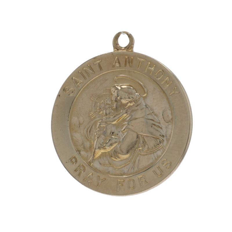 Contenuto del metallo: Oro giallo 14k

Stile: Medaglia della fede
Tema: Sant'Antonio, il viaggio, la fede

Misure

Altezza (dalla cauzione fissa): 27/32