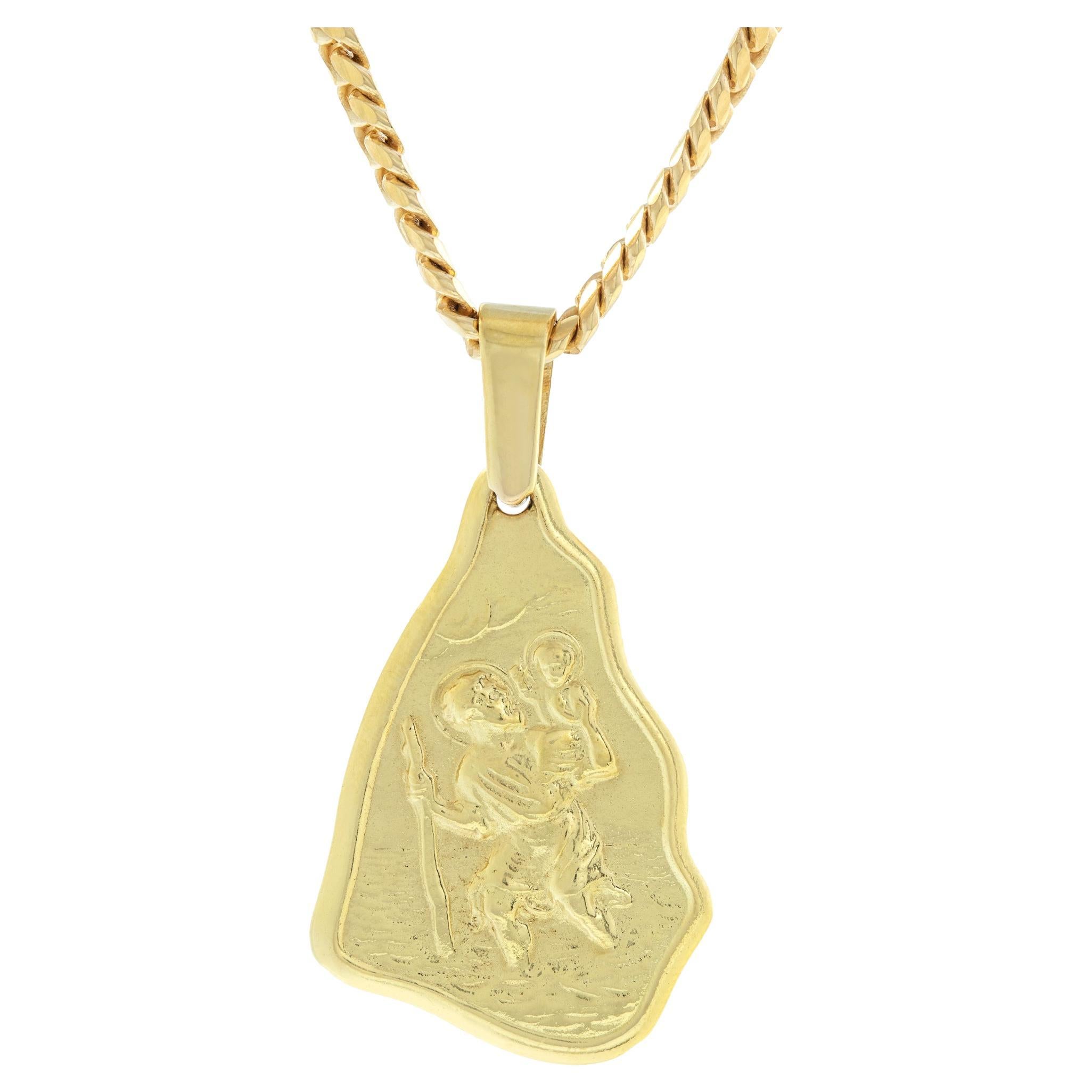 Yellow gold saint charm pendant on flat cuban link chain For Sale