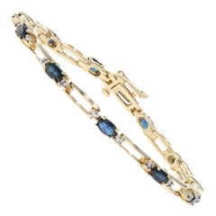 Yellow Gold Sapphire and Diamond Bracelet, 14 Karat Oval Cut 4.65 Carat Link