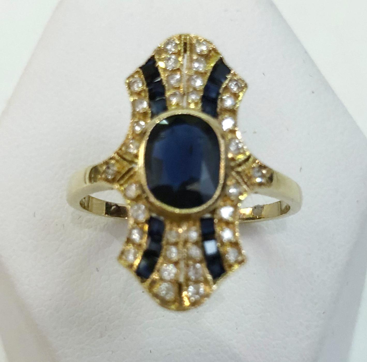 Yellow gold ring with Carre sapphires and Lozenge diamonds / Italy 1960s
Ring size US 7.5