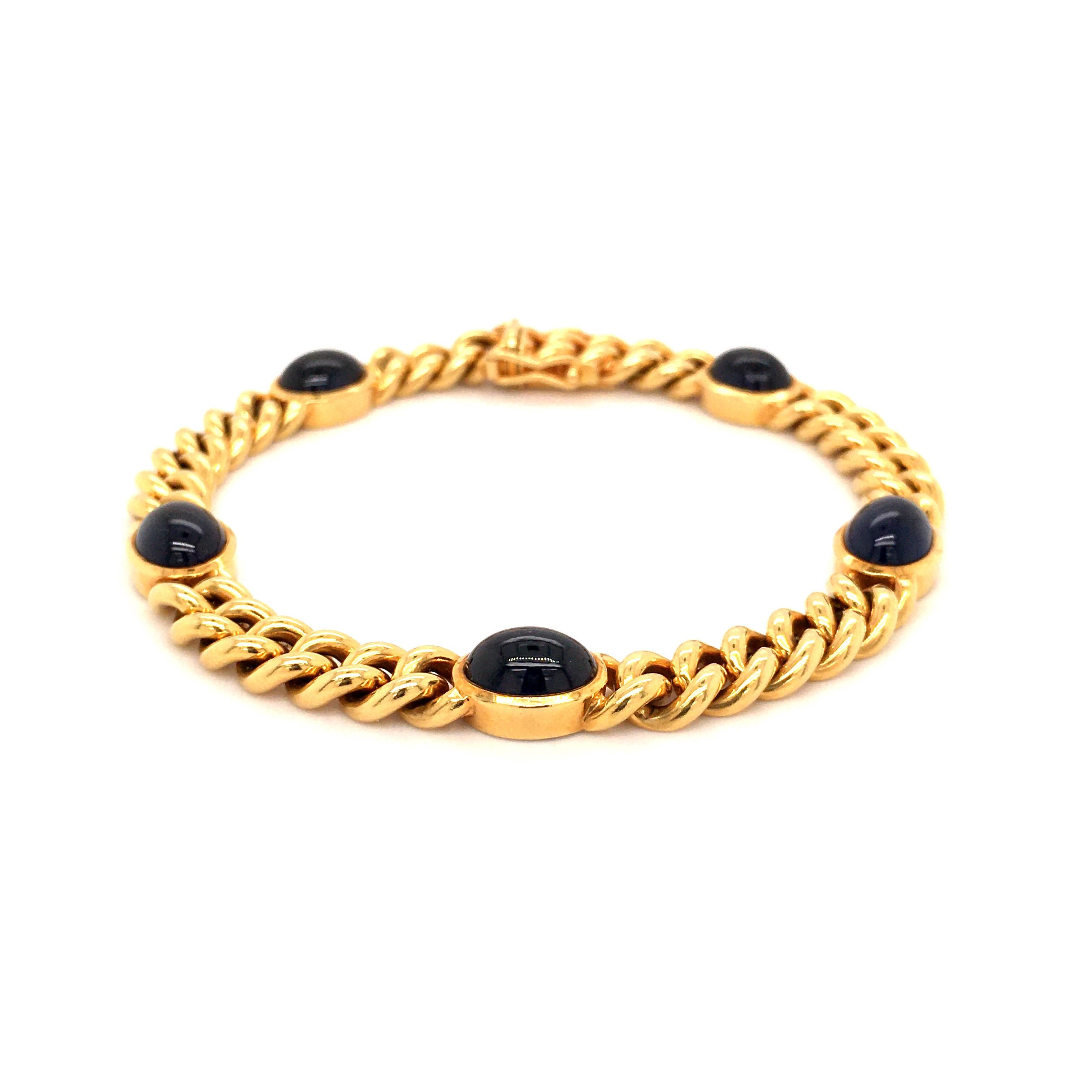 Classic nice bracelet in yellow gold 750 with 5 oval cabochon cut sapphires with an impressing total weight of approx. 14 ct.

Please, ask for additional pictures if you are interested in this item.

Weight: 38.08 grams
Length: 19 cm / 7.48