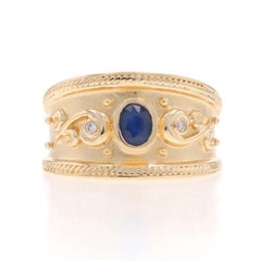 Fascia di diamanti con zaffiro in oro giallo - Anello ovale da 0,36 ct. in 14 ct.