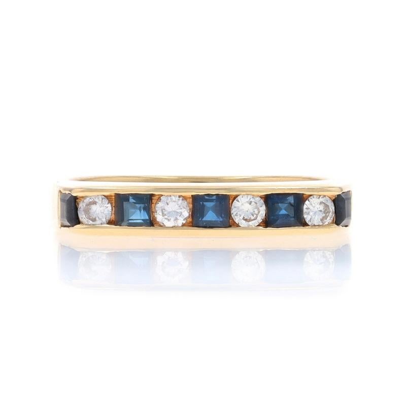 Size: 6 1/2

Metal Content: 14k Yellow Gold

Stone Information

Natural Sapphires
Treatment: Heating
Carat(s): .40ctw
Cut: Square
Color: Blue

Natural Diamonds
Carat(s): .18ctw
Cut: Round Brilliant
Color: G - H
Clarity: VS1 - VS2

Total Carats: