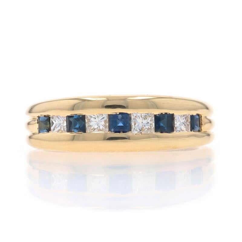 Size: 6

Metal Content: 14k Yellow Gold

Stone Information

Natural Sapphires
Treatment: Heating
Carat(s): .42ctw
Cut: Square
Color: Blue

Natural Diamonds
Carat(s): .33ctw
Cut: Princess
Color: H - I
Clarity: VS1 - VS2

Total Carats: .75ctw

Style: