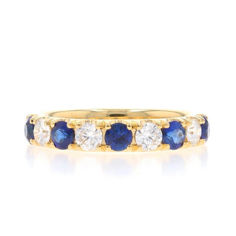 Size: 6 3/4
Sizing Fee: Up 1 1/2 sizes for $60 or Down 1 size for $40

Metal Content: 18k Yellow Gold

Stone Information

Natural Sapphires
Treatment: Heating
Carat(s): .87ctw
Cut: Round
Color: Blue

Natural Diamonds
Carat(s): .50ctw
Cut: Round