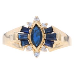 Yellow Gold Sapphire & Diamond Bow Ring - 10k Marquise & Tapered Baguette .73ctw